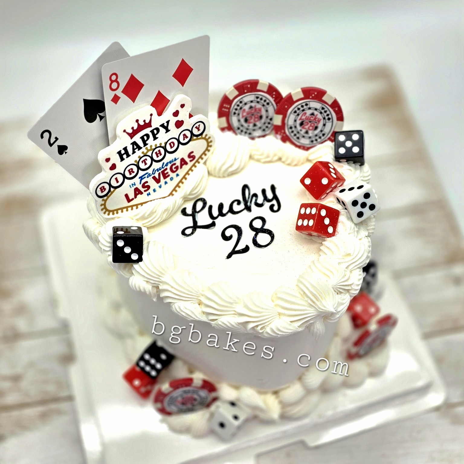 Cherry and gold dice Vegas cake